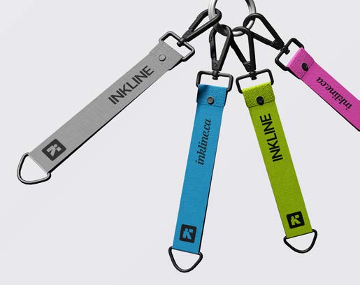 Inkline branded keychains in grey, cerulean, lime and bubblegum