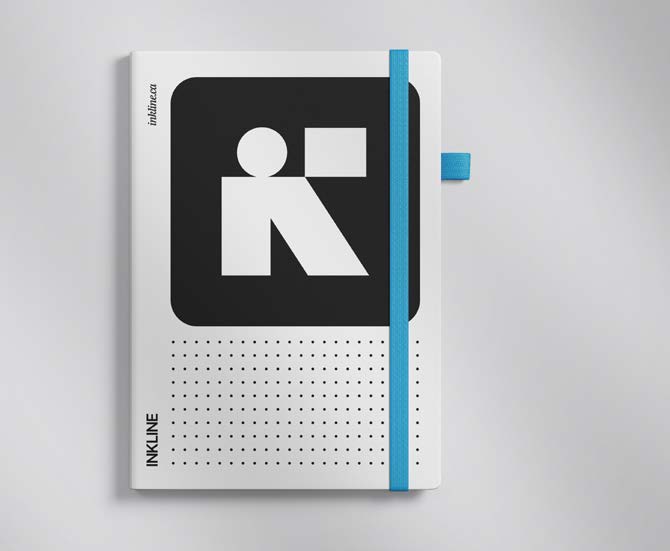 Inkline branded notebook with black logomark and cerulean band