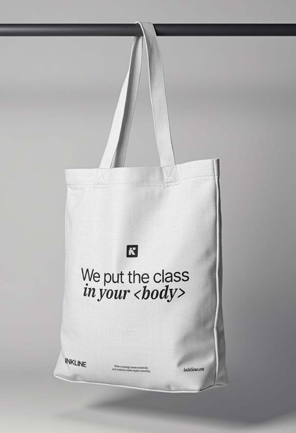 Canvas tote bag with 'We put the class in your body' text
